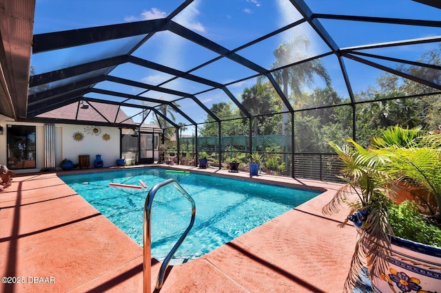 pool featuring a lanai and a patio