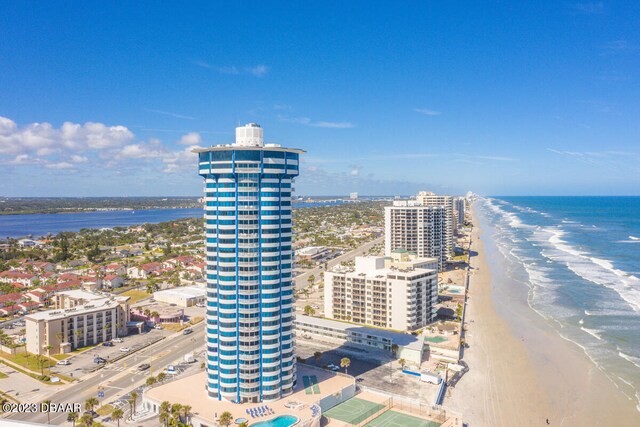 aerial view with a beach view and a water view