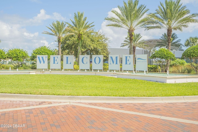 231 Riverside Dr Unit 2601-1, Daytona Beach, FL 32117 - surrounding community featuring a yard