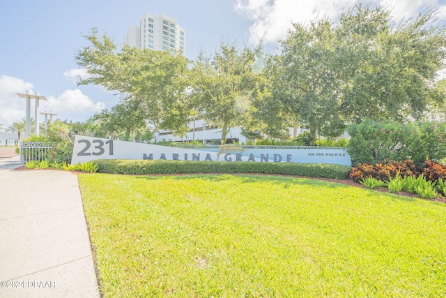 231 Riverside Dr Unit 2601-1, Daytona Beach, FL 32117 - community sign featuring a yard