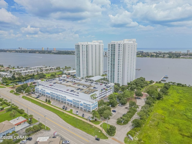 drone / aerial view with a water view