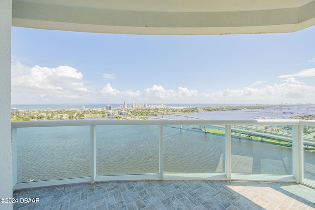 balcony featuring a water view