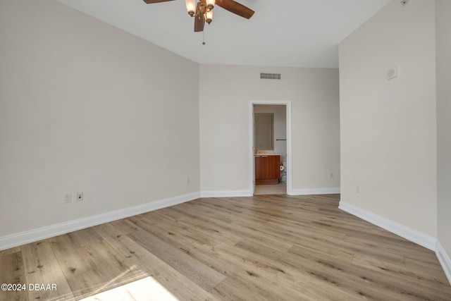 spare room with light hardwood / wood-style floors and ceiling fan