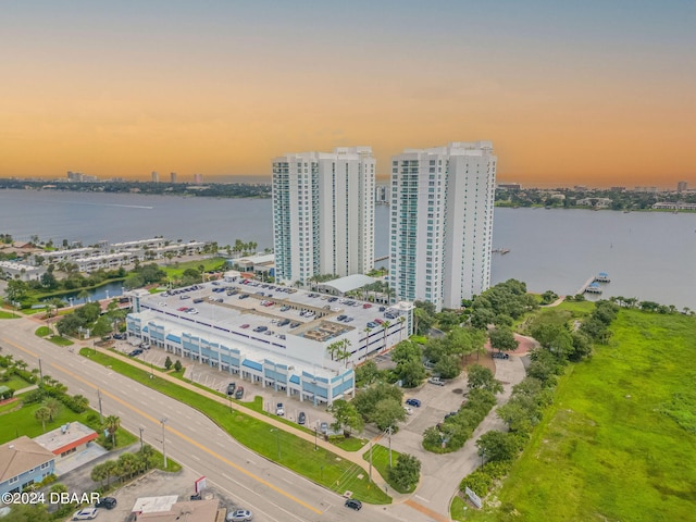 231 Riverside Dr Unit 2601-1, Daytona Beach, FL 32117 - aerial view at dusk of a water view and a city view