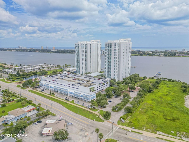 drone / aerial view with a water view