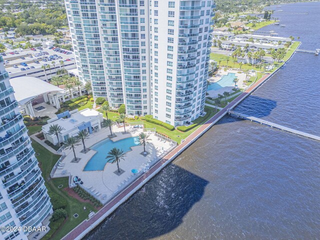 birds eye view of property featuring a water view