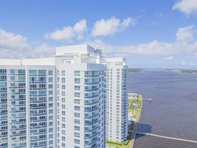 view of building exterior featuring a water view