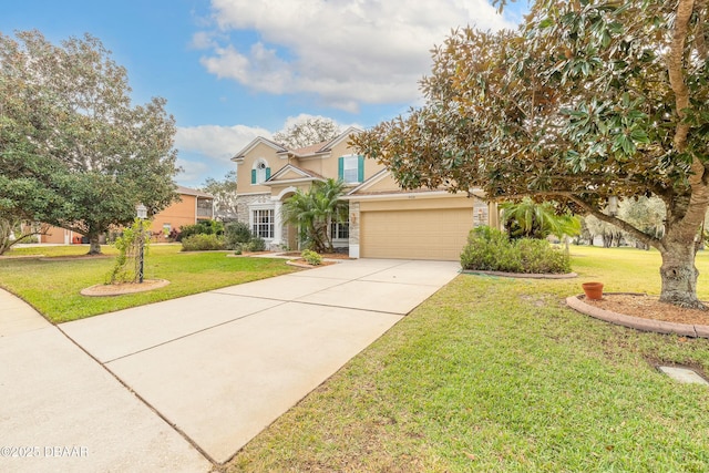 view of front of home featuring a front lawn and a garage