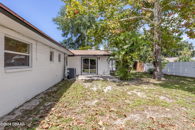 1703 Hill St, Edgewater, FL 32132 - view of yard featuring a patio and central air condition unit