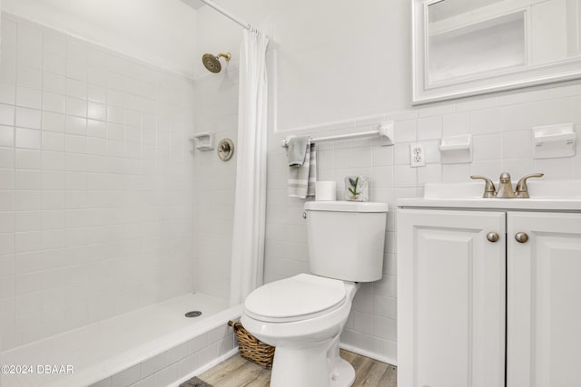 1703 Hill St, Edgewater, FL 32132 - bathroom featuring hardwood / wood-style floors, a shower with shower curtain, toilet, and vanity