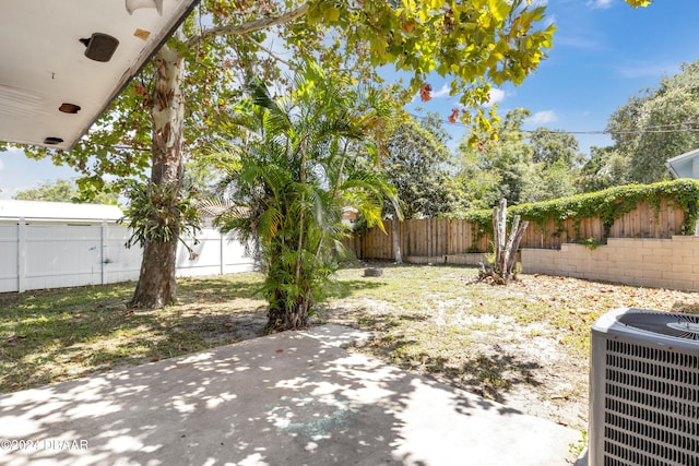 1703 Hill St, Edgewater, FL 32132 - view of yard featuring central air condition unit and a patio area