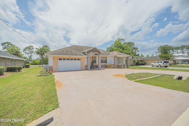 ranch-style home with a garage and a front yard