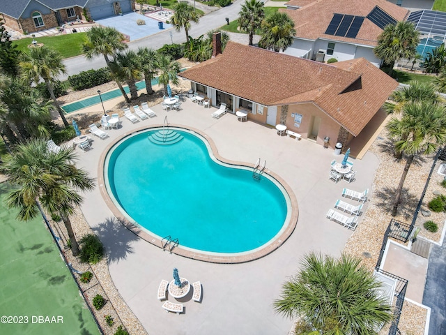 view of pool featuring a patio