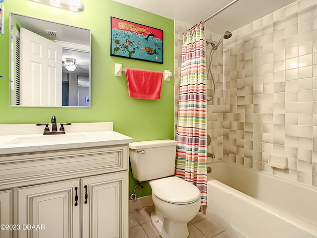 full bathroom with vanity, tile patterned floors, toilet, and shower / bathtub combination with curtain