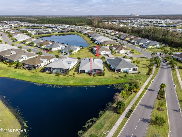 drone / aerial view with a water view