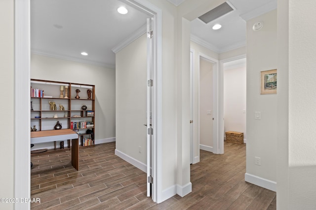 hall with wood-type flooring and crown molding