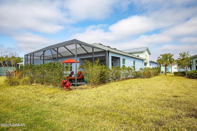 view of yard featuring a lanai