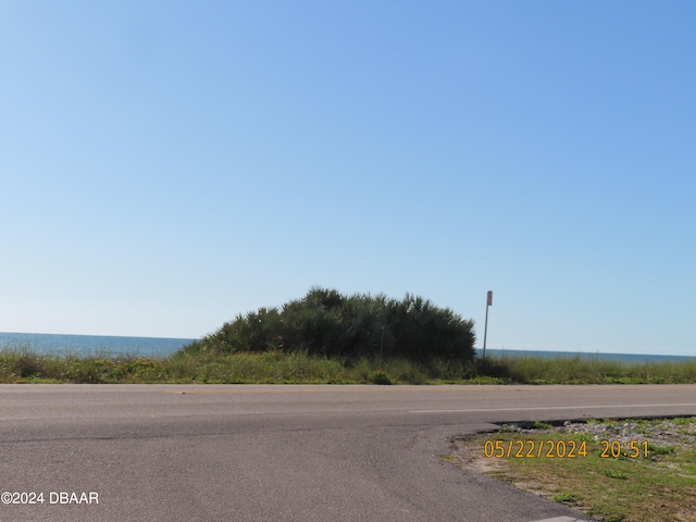 view of road with a water view