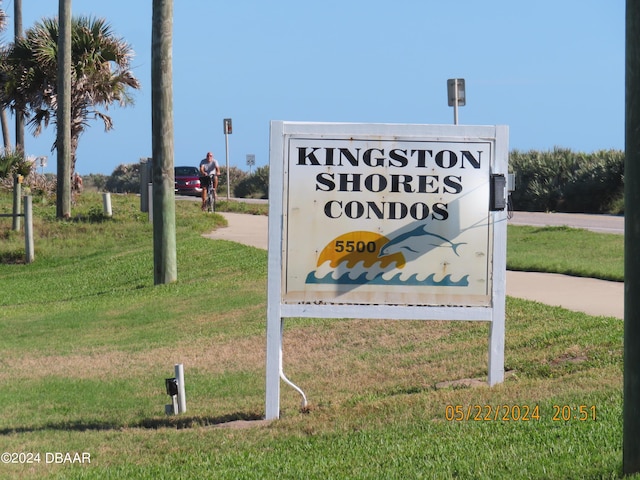 5500 Ocean Shore Blvd Unit 76, Ormond Beach, FL 32176 - community sign with a lawn