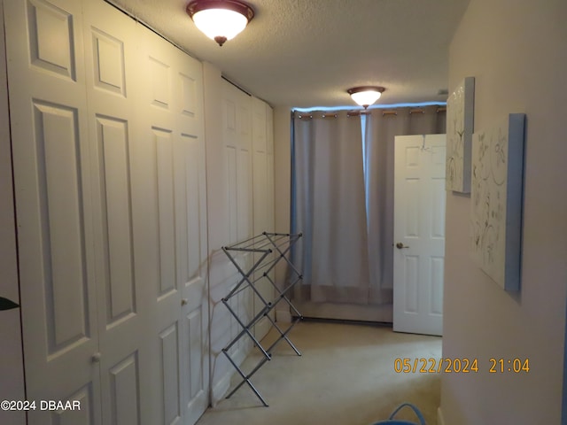 interior space featuring a textured ceiling