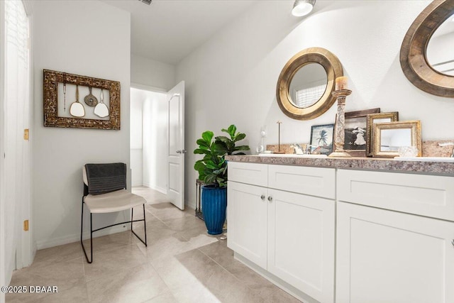 bathroom featuring vanity and tile patterned floors