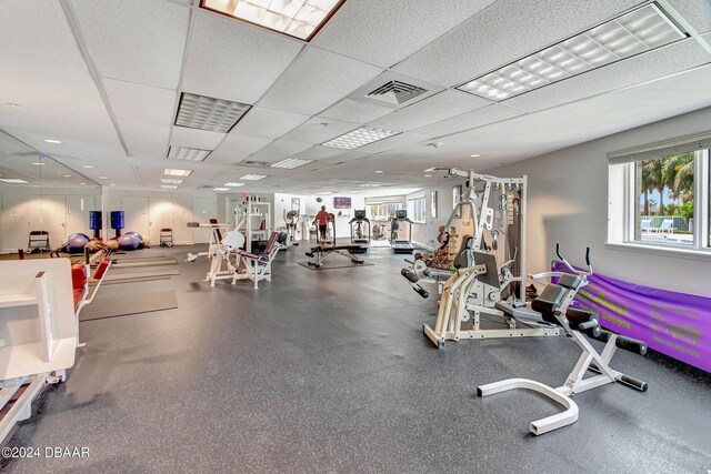 2 Oceans W Blvd Unit 204, Daytona Beach Shores, FL 32118 - workout area with a paneled ceiling