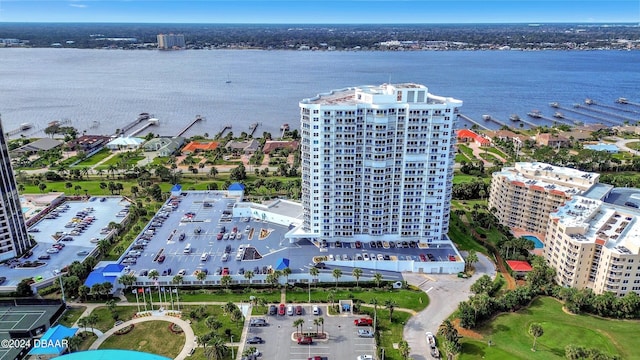 birds eye view of property with a water view