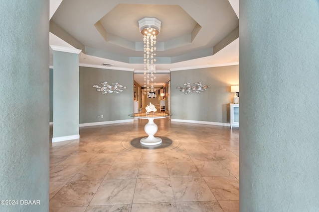 2 Oceans W Blvd Unit 204, Daytona Beach Shores, FL 32118 - corridor with a textured wall, a raised ceiling, and a chandelier