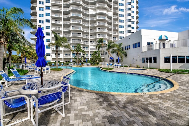 2 Oceans W Blvd Unit 204, Daytona Beach Shores, FL 32118 - community pool with a patio area