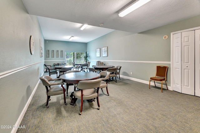 2 Oceans W Blvd Unit 204, Daytona Beach Shores, FL 32118 - dining space featuring baseboards and carpet floors