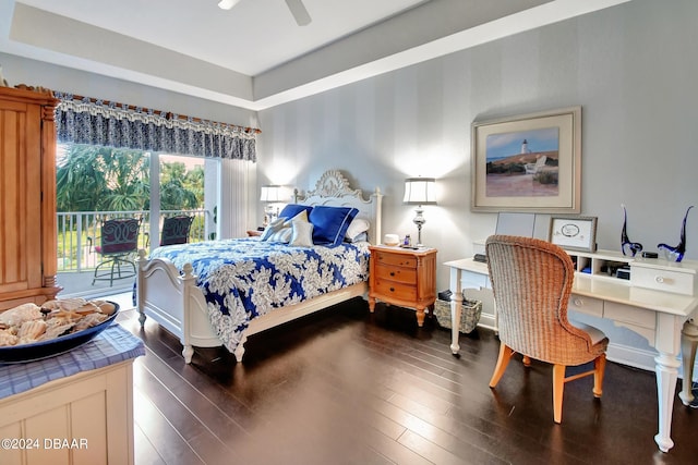 bedroom with ceiling fan, dark hardwood / wood-style floors, and access to outside