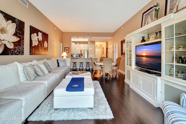 2 Oceans W Blvd Unit 204, Daytona Beach Shores, FL 32118 - living area with dark wood-type flooring