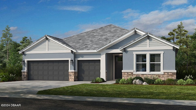 craftsman inspired home featuring a garage and a front lawn