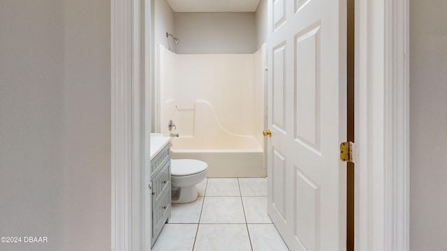 full bathroom featuring vanity, tile patterned floors, toilet, and bathing tub / shower combination