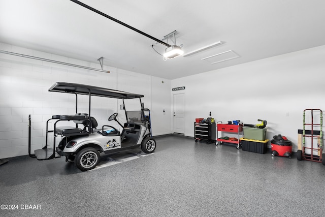 garage featuring a garage door opener