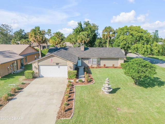 ranch-style house featuring a garage and a front lawn