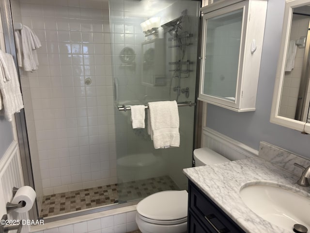 3580 S Ocean Shore Blvd Unit 404, Flagler Beach, FL 32136 - full bathroom with a shower stall, toilet, and vanity