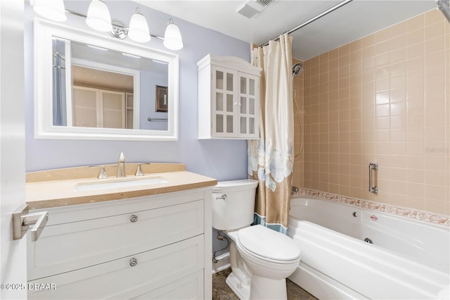 full bathroom featuring vanity, shower / bath combination with curtain, and toilet