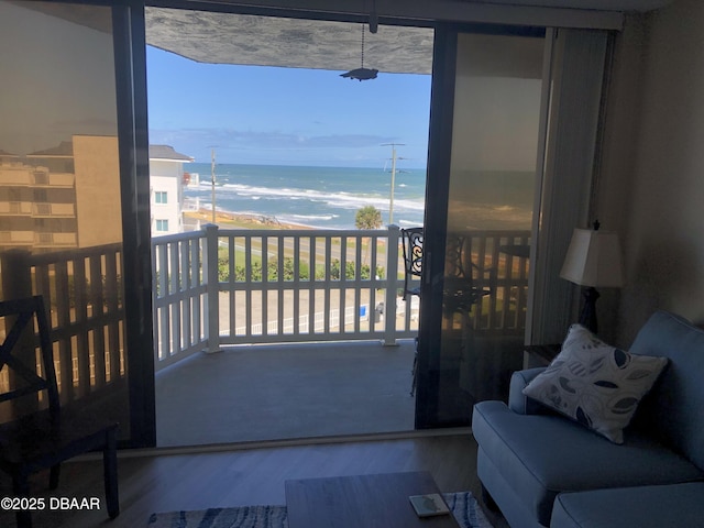 balcony with a view of the beach and a water view