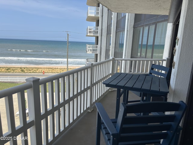 3580 S Ocean Shore Blvd Unit 404, Flagler Beach, FL 32136 - balcony featuring view of water and beach
