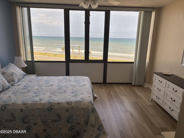 3580 S Ocean Shore Blvd Unit 404, Flagler Beach, FL 32136 - bedroom with light wood-style floors
