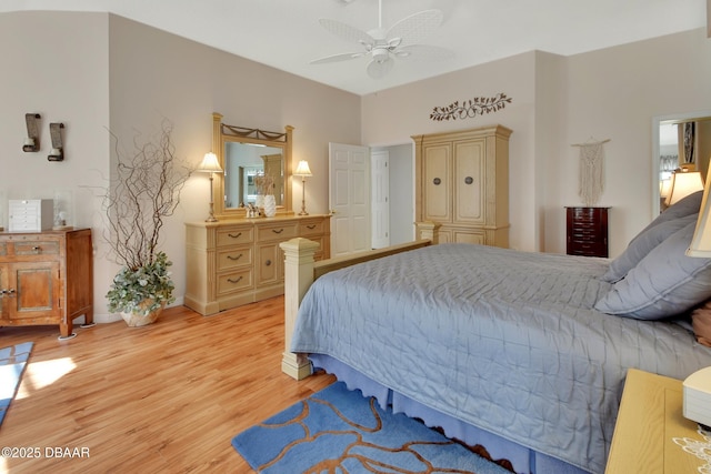 bedroom with ceiling fan and light hardwood / wood-style floors