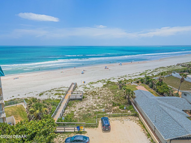 aerial view with a beach view and a water view