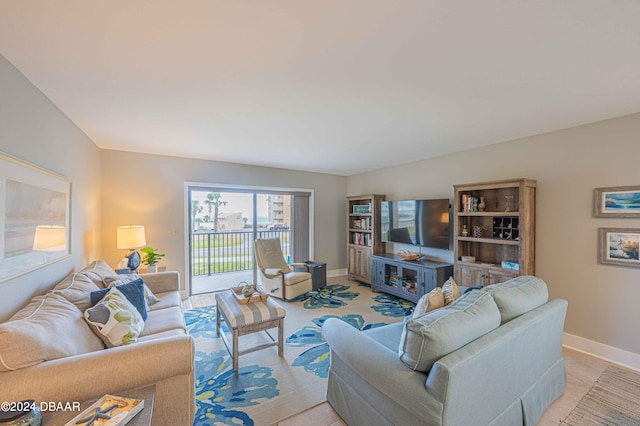 living room with vaulted ceiling