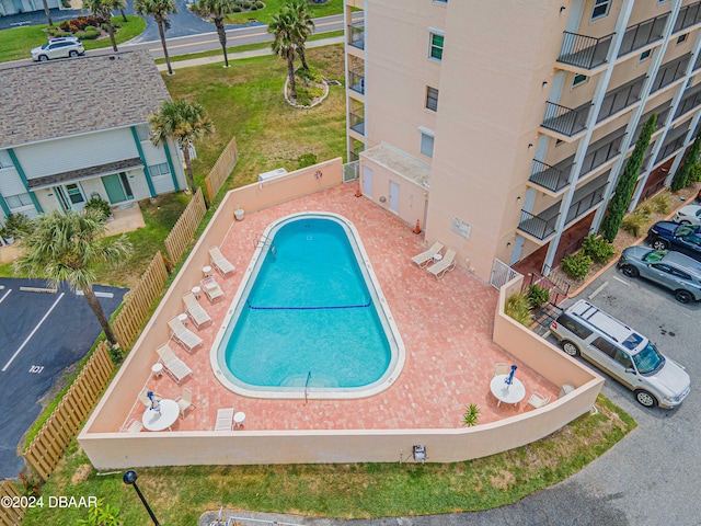 view of pool featuring a patio area