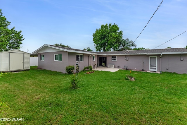 1713 Caldwell Rd, South Daytona, FL 32119 - rear view of property featuring a patio and a yard