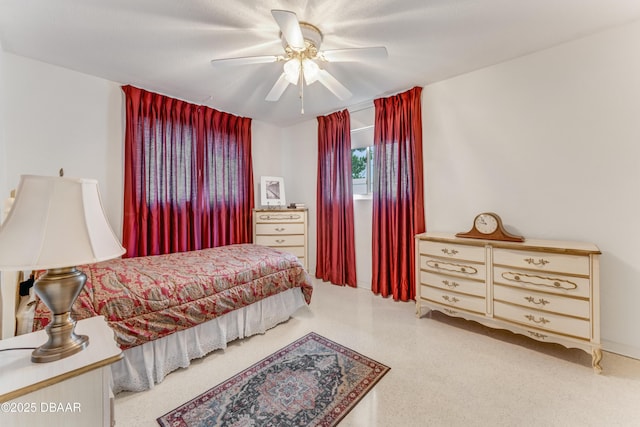 1713 Caldwell Rd, South Daytona, FL 32119 - bedroom with speckle patterned floor and a ceiling fan