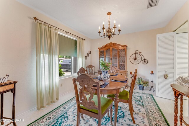1713 Caldwell Rd, South Daytona, FL 32119 - dining area featuring a chandelier and baseboards