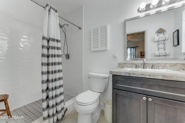 1713 Caldwell Rd, South Daytona, FL 32119 - bathroom with vanity, a shower stall, and toilet