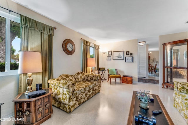 1713 Caldwell Rd, South Daytona, FL 32119 - living area with dark aggregate flooring